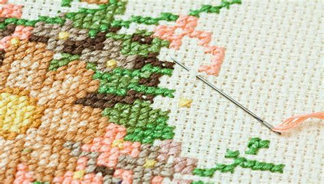 What is the Difference Between Embroidery and Cross Stitch and Can One Form of Art Evoke More Emotion Than the Other?